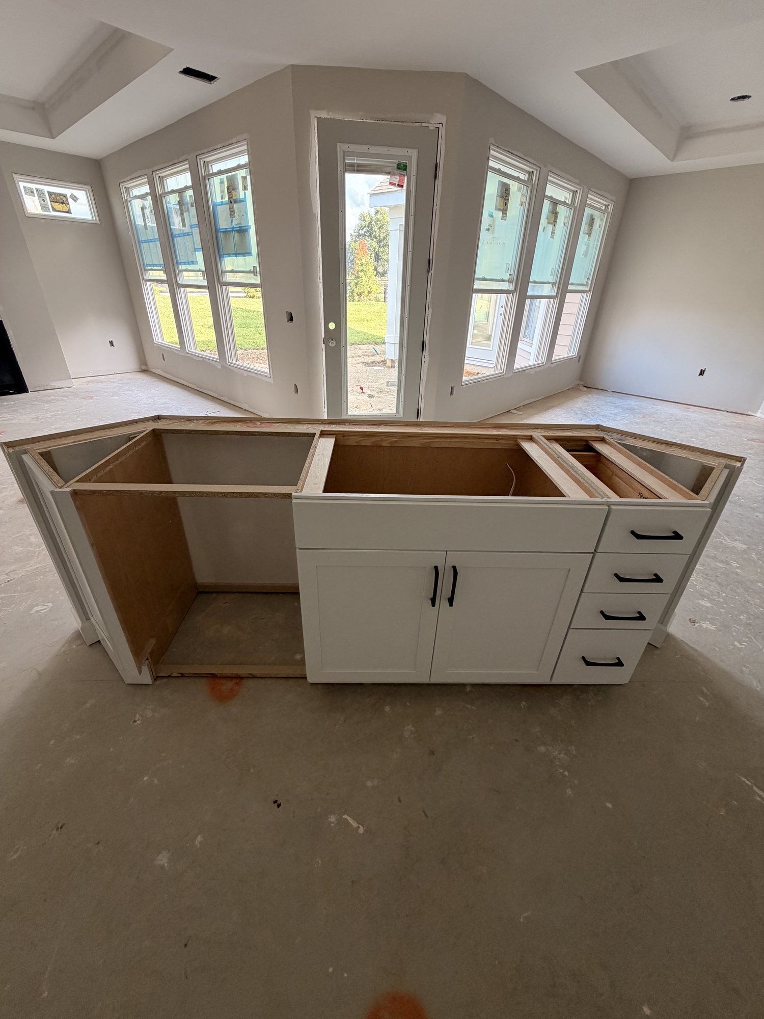 Island carcass set and levelled under bay windows